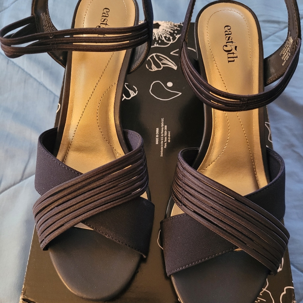 Brand new (never worn) dark blue high-heeled shoes